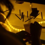 Regina Basse fills out her ballot for Organized Mess