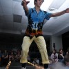 Sophomore Will Oakley reaches for the crowd.