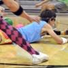 Carter Olander stretches to reach the dodge-balls.  Photo by AnnaMarie Oakley