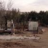 A greenhouse made by kids at Dahur's camp. It is made out of flattened plastic water bottle.