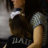 Coach Shawn Hair's wife and daughter. Photo by Jake Crandall