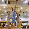 Sophomore Lucas Jones goes in for the layup. Photo by Maddie Schoemann