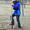 Sophomore Will Oakley begins to dig a hole for a fire. Photo by AnnaMarie Oakley.