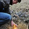 Sophomore Will Oakley successfully lights his fire. Photo by AnneMarie Oakley.