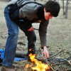 Sophomore Will Oakley watches as his fire begins to grow. Photo by AnnaMarie Oakley.