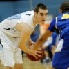 Vance Wentz protects the ball from his Olathe South opponent. Photo by McKenzie Swanson
