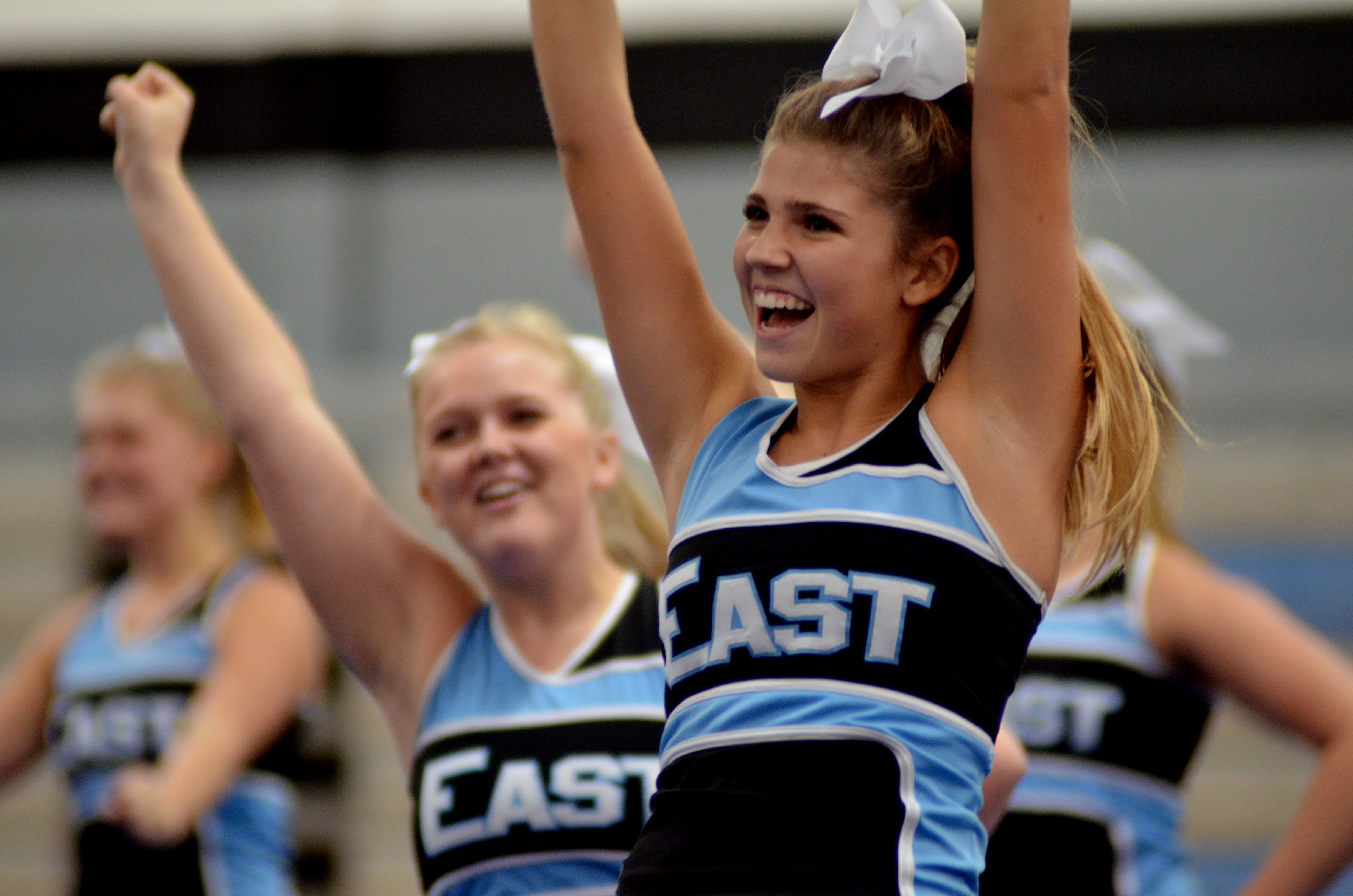 Sophomore Maggie Gray Cheers Along With Her Cheer Squad Photo By Izzy