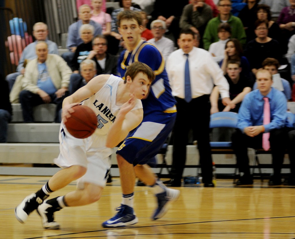 Senior Connor Knabe drives past his defender.  Photo by McKenzie Swanson