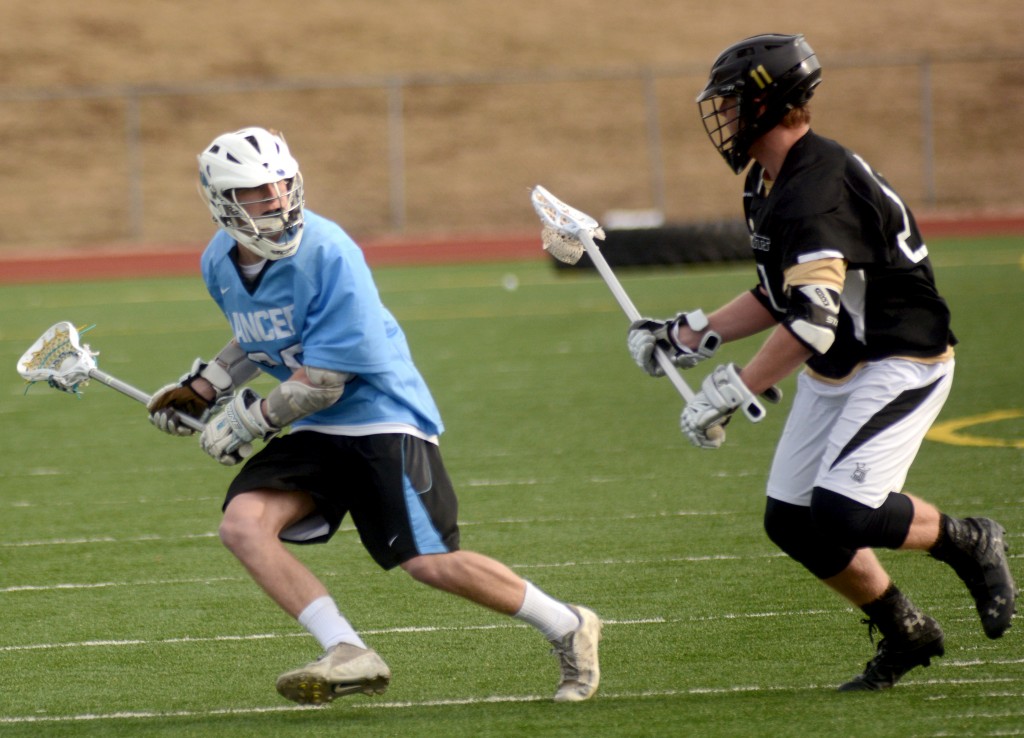 Junior Nic Bailey tries to get around his defender. Photo by Callie McPhail