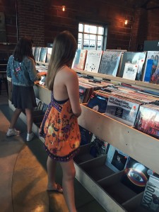Elle and some friends check out records in Josey's Records