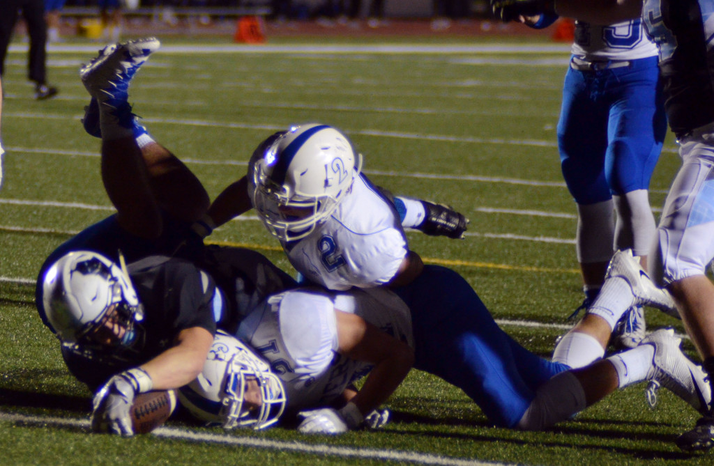 The final touchdown was scored with a reach into the endzone. Photo by Izzy Zanone