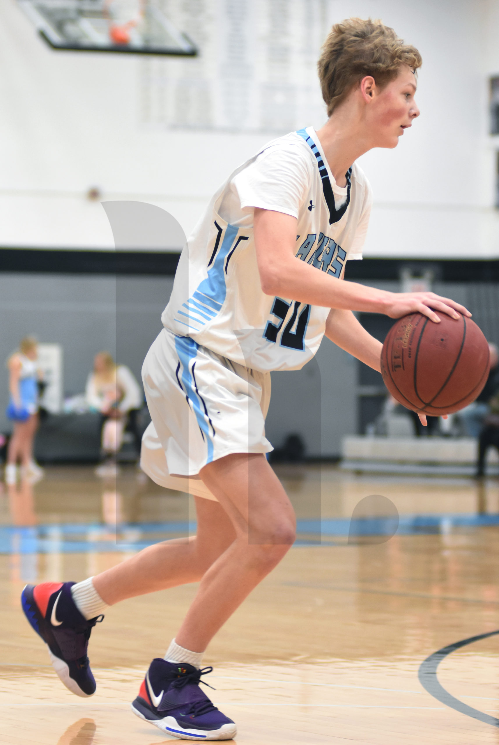 Freshman Owen Richardson Dribbles Around Other Team Photo By Mj Wolf The Harbinger Online