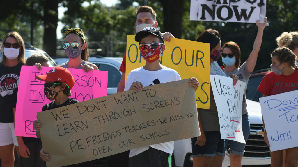The SMSD community protests for in-person learning and lift of temporary school sport suspension, while others defend the districts decision