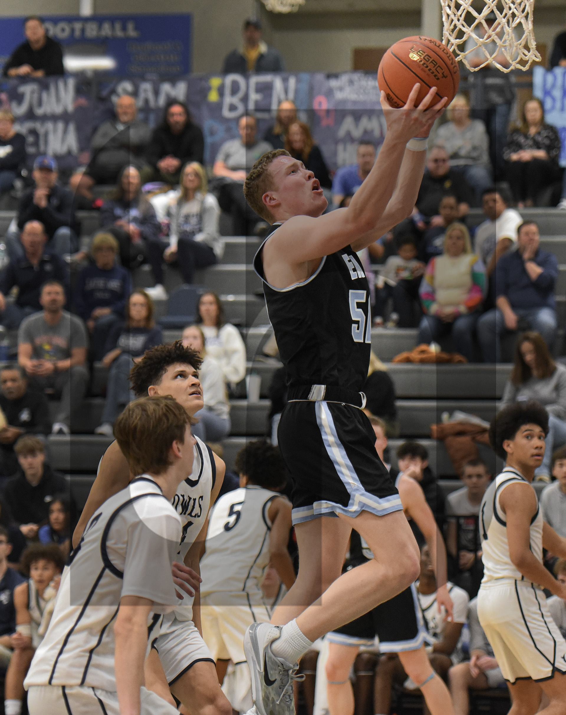 Gallery: Boys Varsity Basketball Defeats Olathe West 61-46